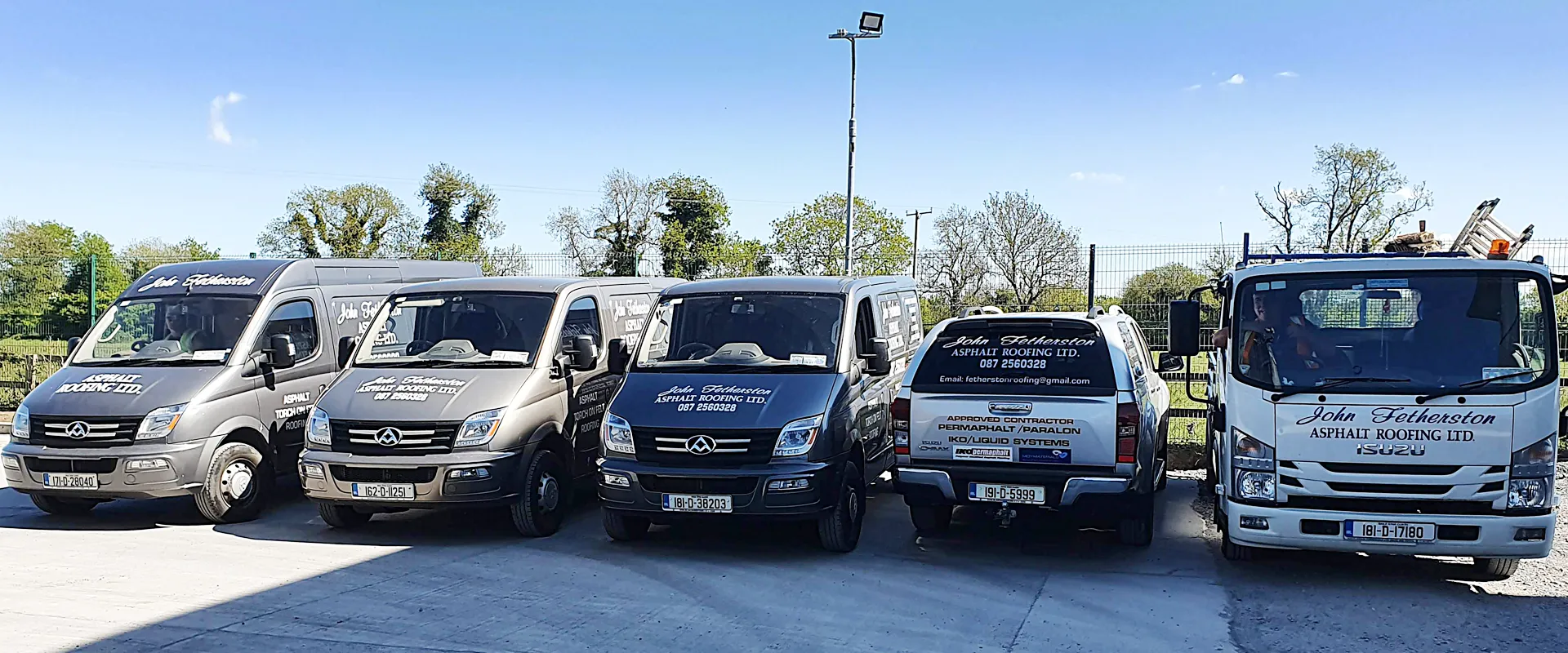 Aerial view of Dublin City skyline featuring a mix of modern office building and traditional residential houses.