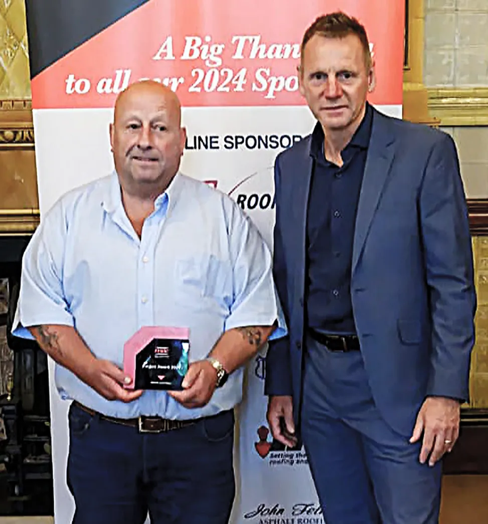 John Fetherston and special guest football player Stuart Pearce at the M.A.C. awards.